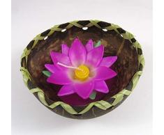 Candela profumata decorativa a forma di fiore di loto rosa in mezzo guscio di noce di cocco.